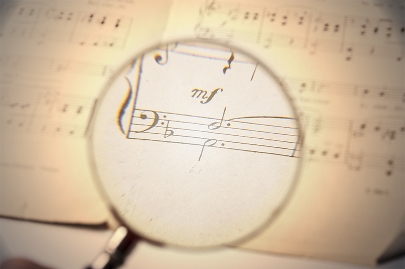 magnifying glass on music sheet