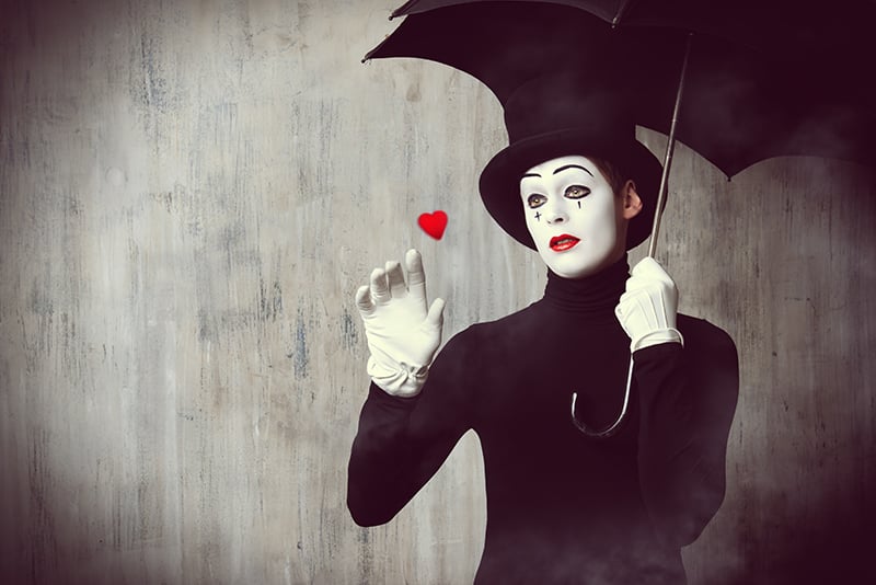 mime with umbrella