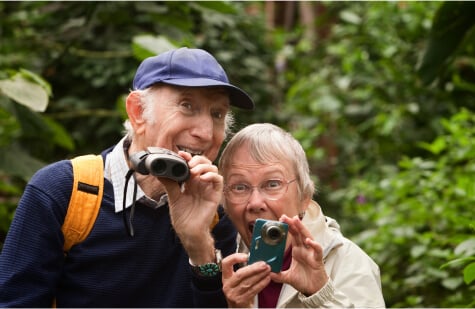 older couple birdwatching