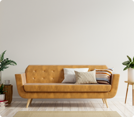 yellow sofa with plants