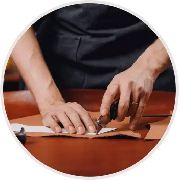 cutting-leather-with-help-of-cutter